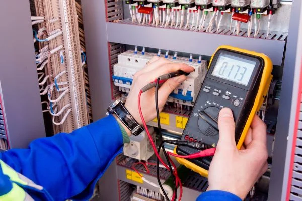 Why do electricians use a digital multimeter