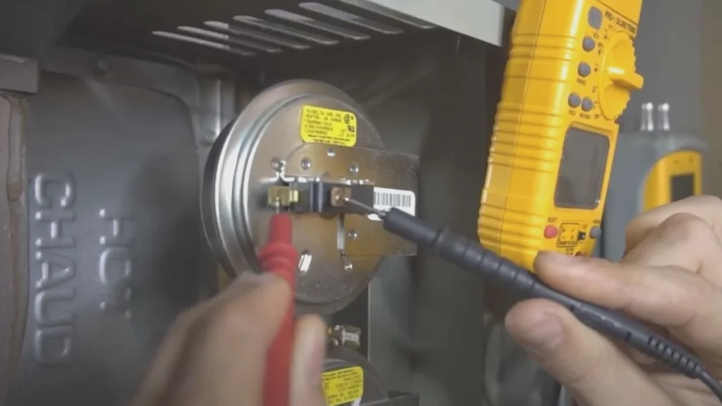How to check hot water heater thermostat?
