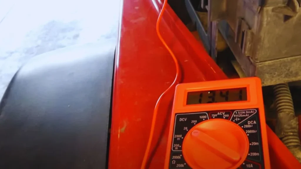 Testing the voltage of your car battery using DMM